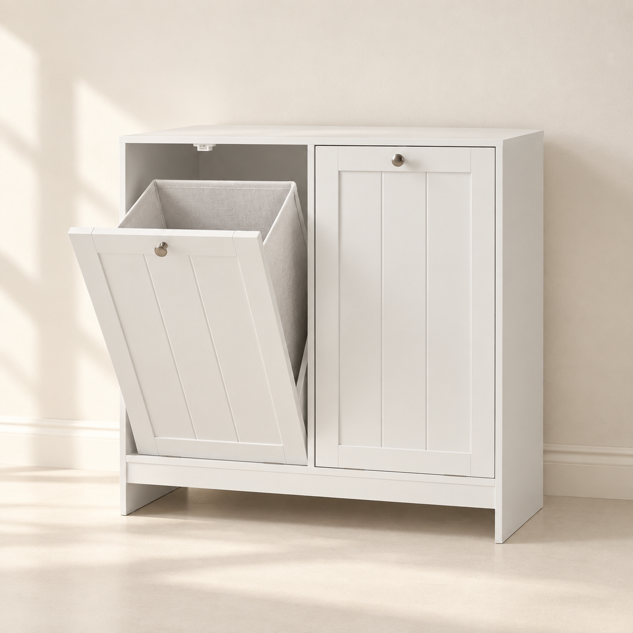 Concealed tilt-out laundry cabinet